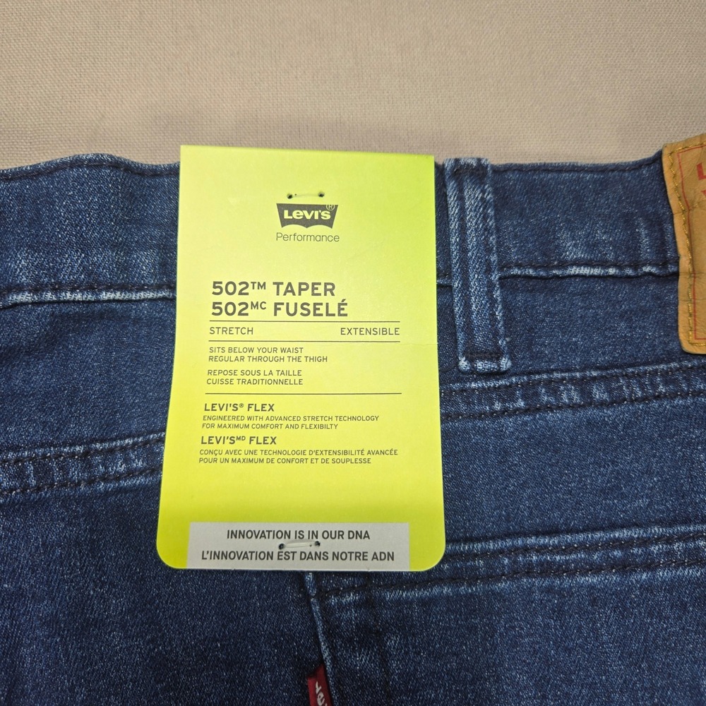 Levi's Jeans 502 Taper Flex Stretch Medium Wash Blue Mens 48x34 - Picture 14 of 16